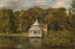 A small white cottage by the river